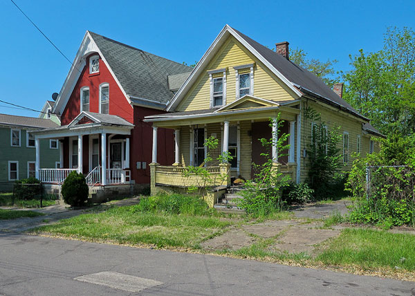 54 Pershing and its charming, well-maintained brick neighbor.
